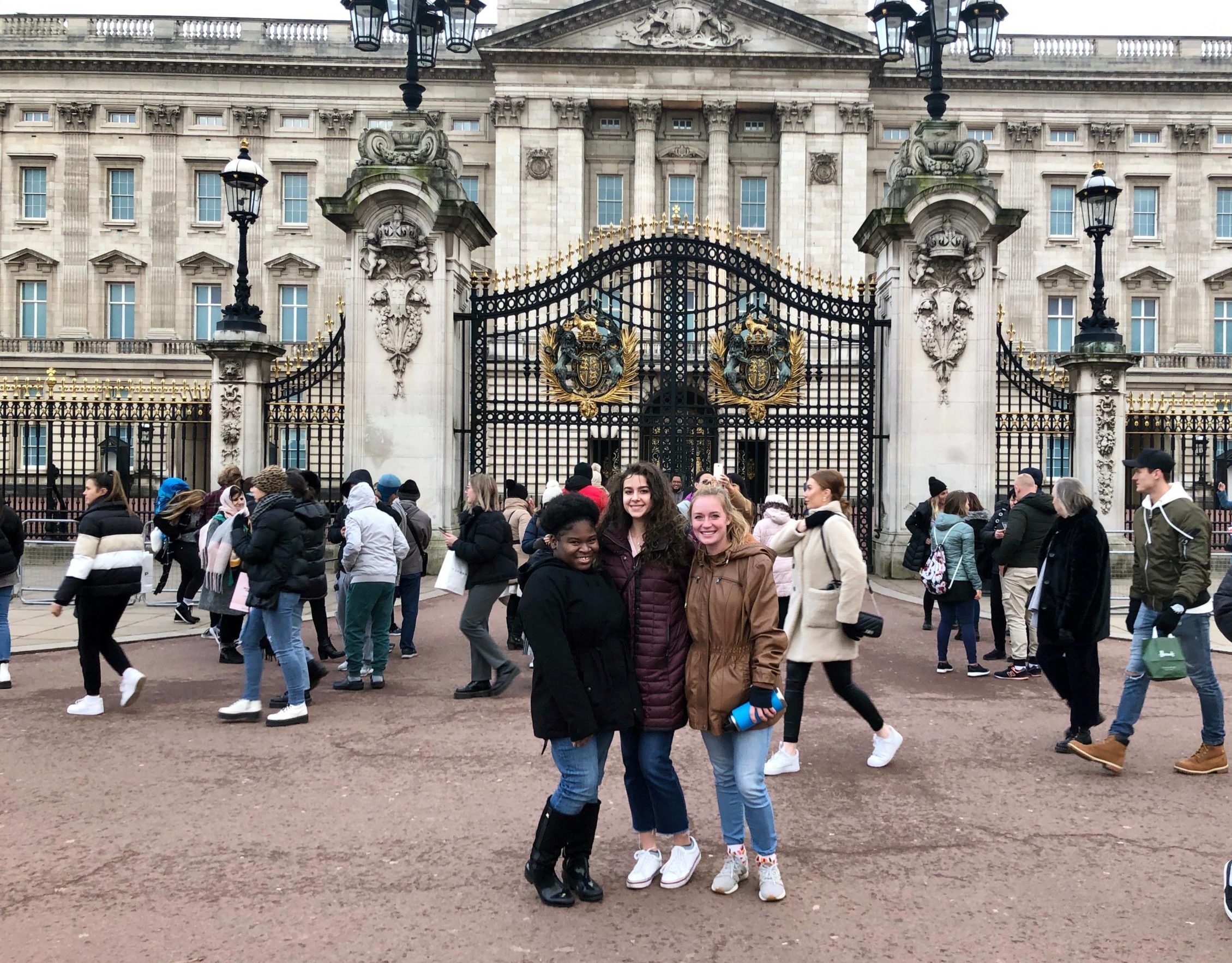 Students posing in front of Buckingham Palace, London, England