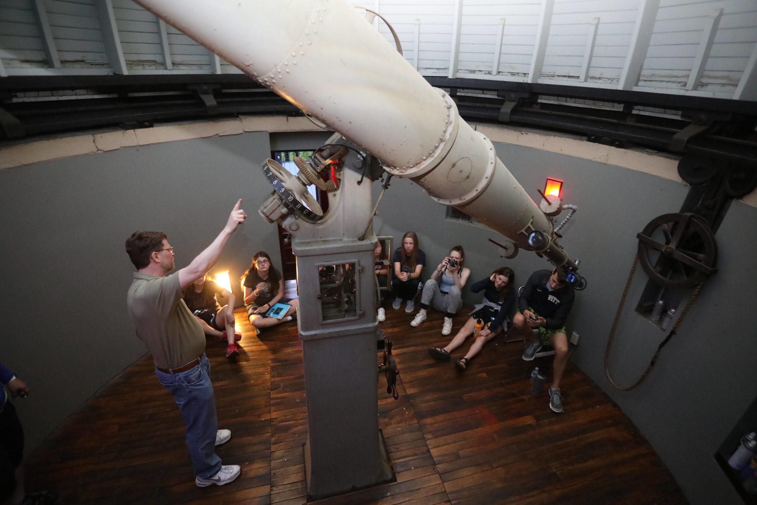 Students using a space telescope