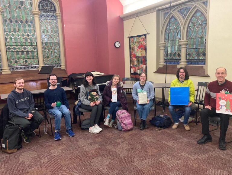 a group of students sitting in chairs