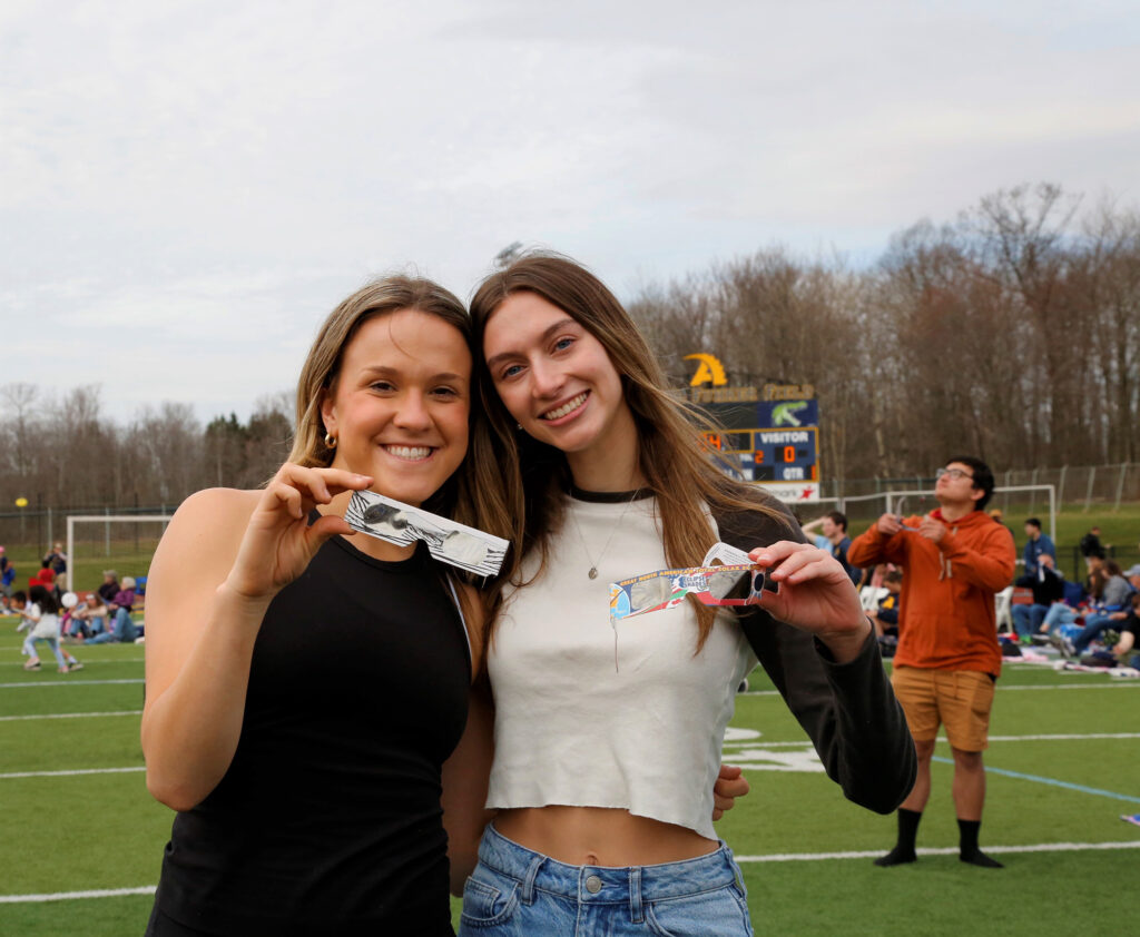 Students with eclipse glasses