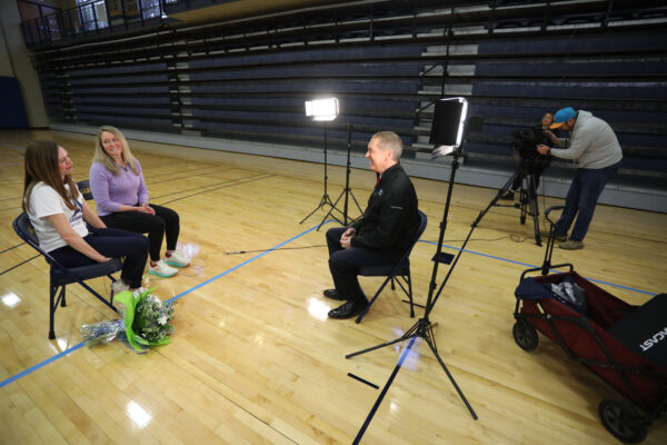 Allison Roberts Hodas '06 and Jess Kankoski Goeller '04 reunited for an interview with WTAE's Mike Clark at Allegheny's David V. Wise Athletic Center on March 29, 2024