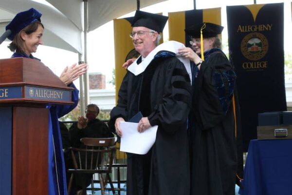 a person in a graduation gown