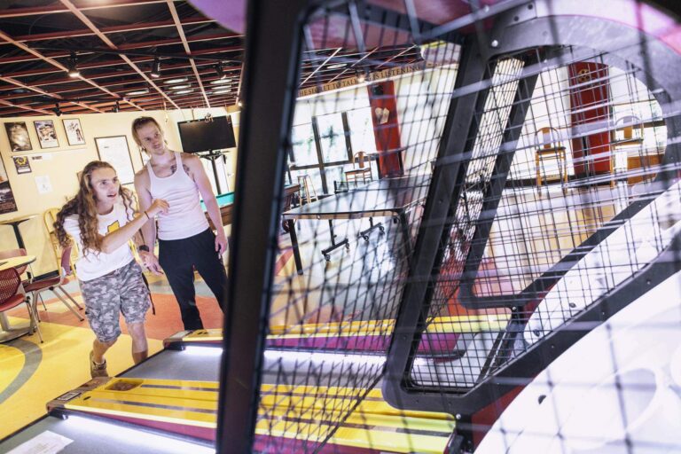 Students playing in the game room