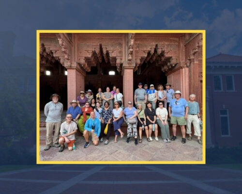Allegheny College 2026 Alumni Tour group standing at the portals of history in the UNESCO World Heritage site of Agra Fort