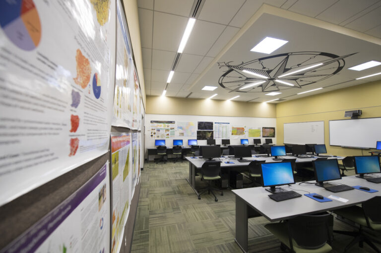 GIS lab at Allegheny College with posters on the walls and computers