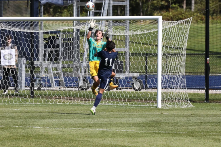 Boys playing soccer.