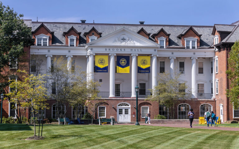 Front of the historic Brooks Hall in summer.