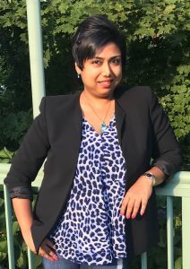 portrait of a person leaning on a railing