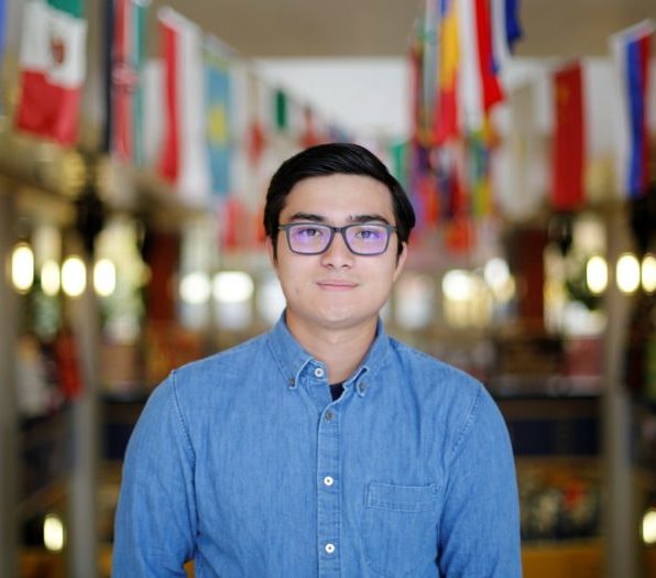 portrait of a person in a blue shirt