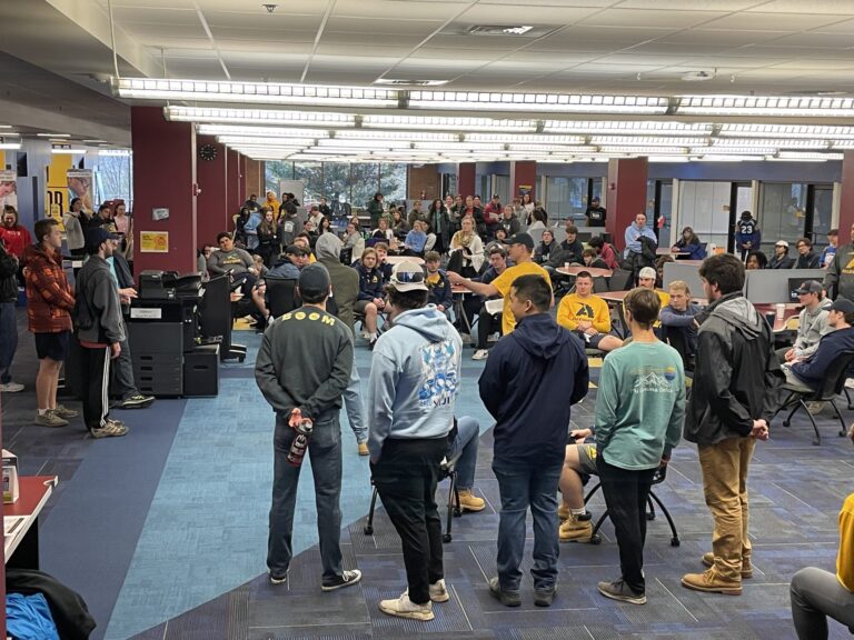 a group of people standing in a room