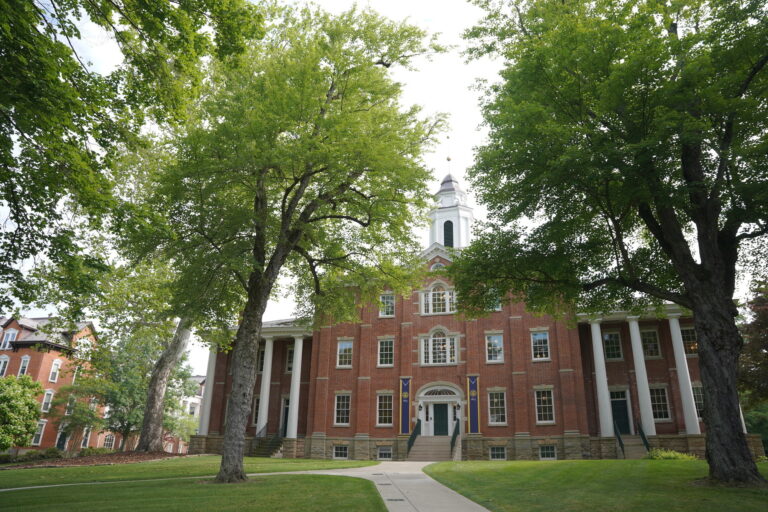 a large brick building with a bell tower