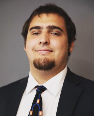 portrait of a student in a suit and tie