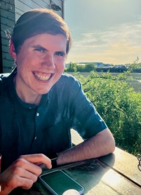 a person smiling at camera