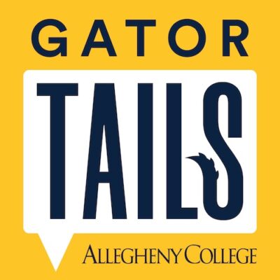 a yellow square with black text "gator tails"