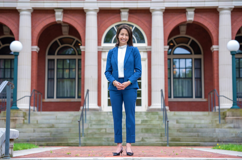 portrait of Hilary Link in front of a building