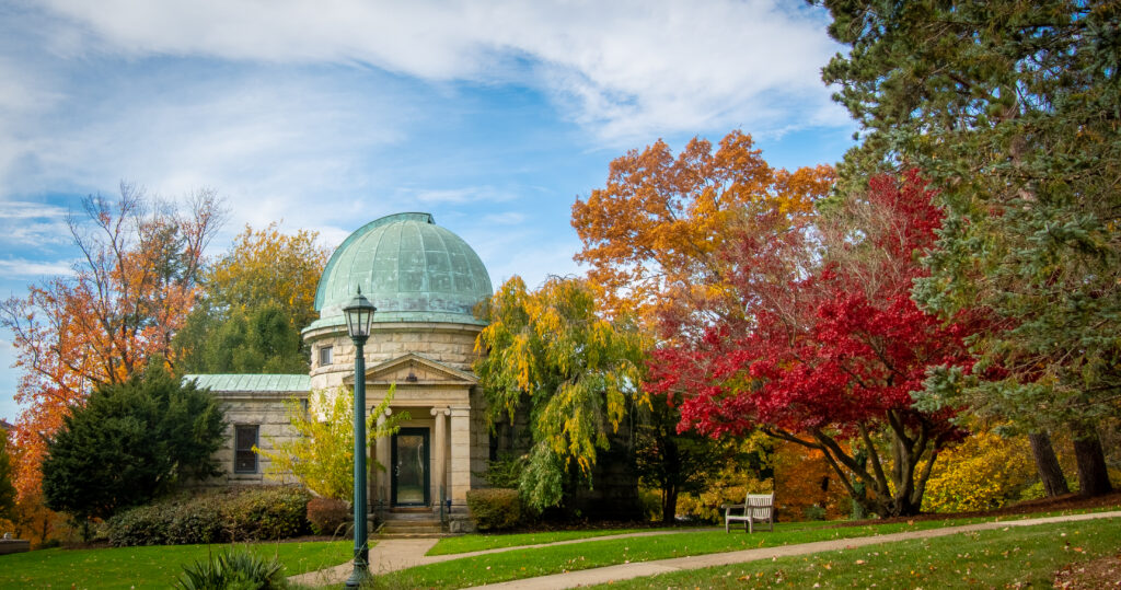 Observatory amid colorful trees at the beginning of fall