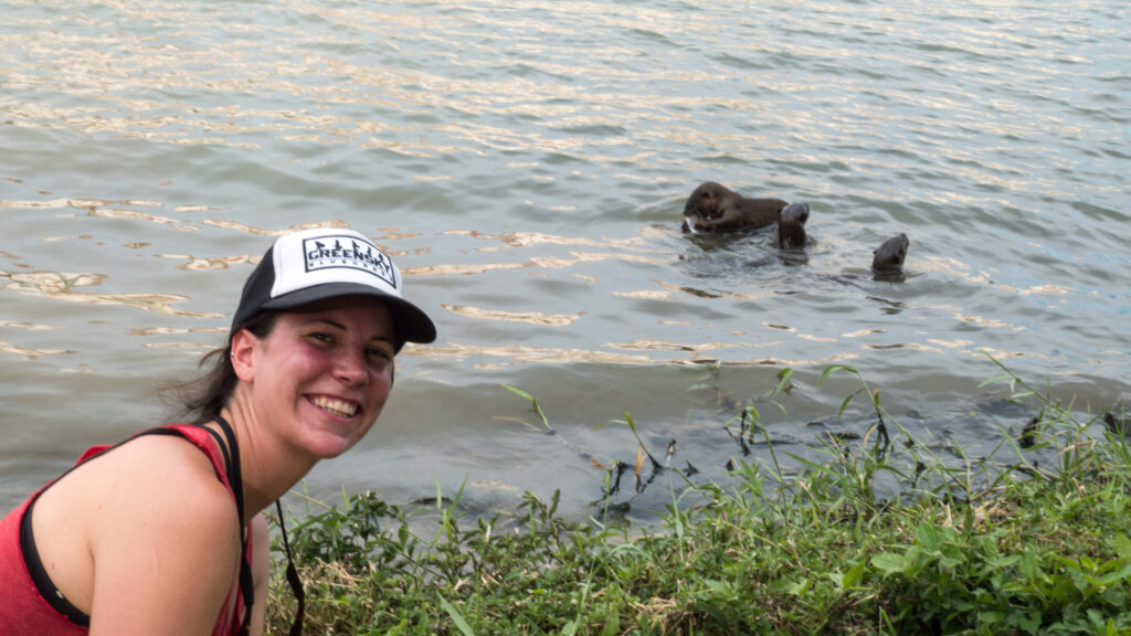 Professor in front of waterfront.