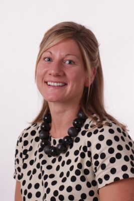 portrait of a person wearing a polka dot shirt