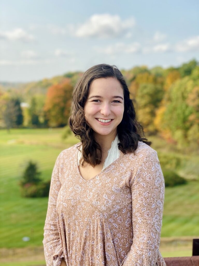 portrait of a person smiling at the camera