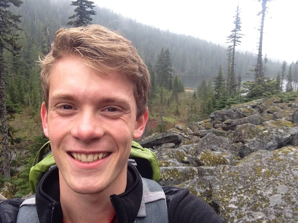 a person taking a selfie on a hiking trail