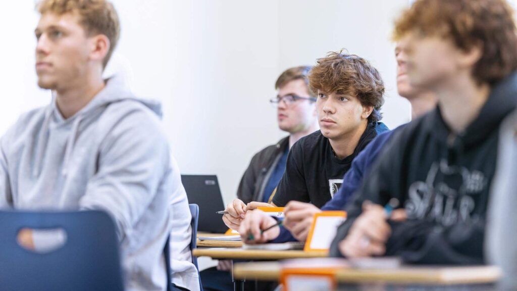 a group of students sitting at desks