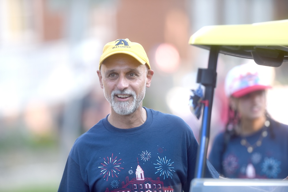 Allegheny College President Ron Cole walks during the July 3 parade for USA 250 in Meadville, PA