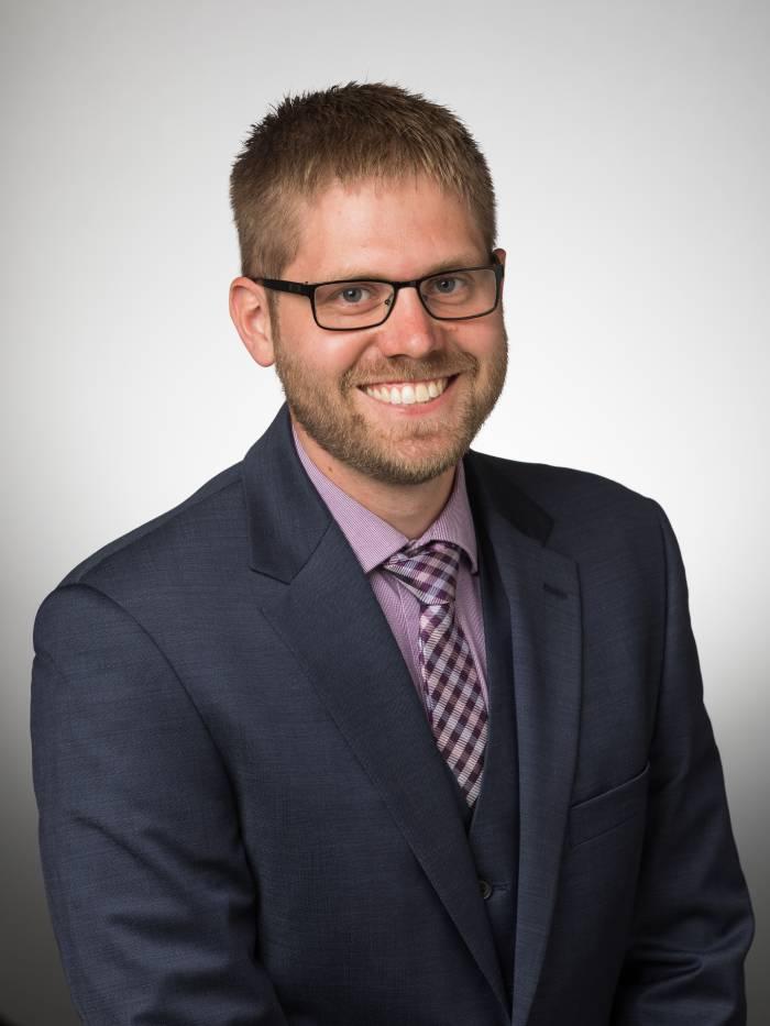 portrait of a person in a suit and tie