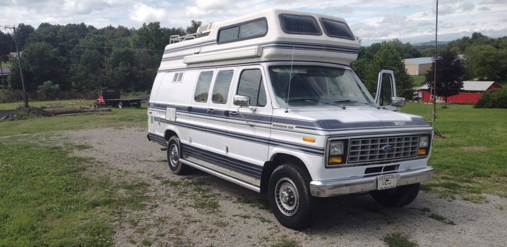 a white van with a roof top