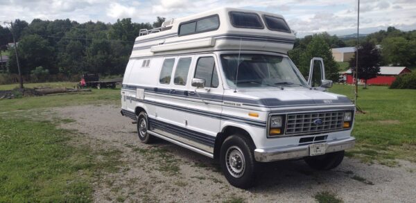 a white van with a roof top