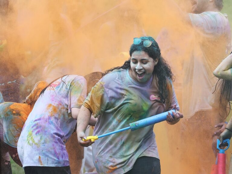 A group of Allegheny College students celebrate 2026 Holi