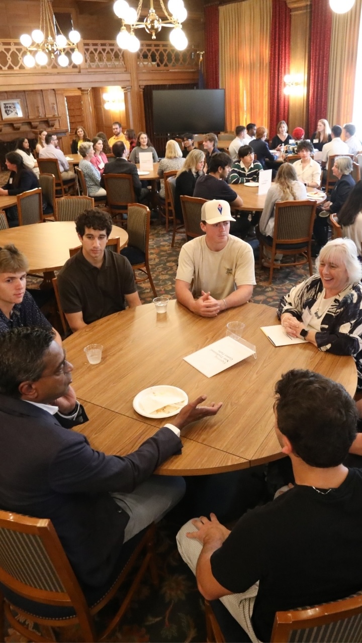 A group of people have roundtable discussions