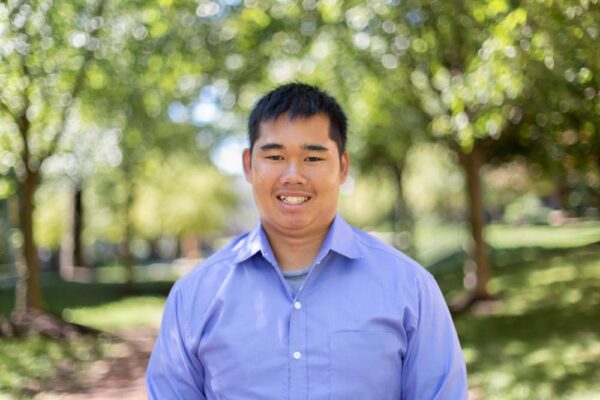 portrait of a person in a blue shirt