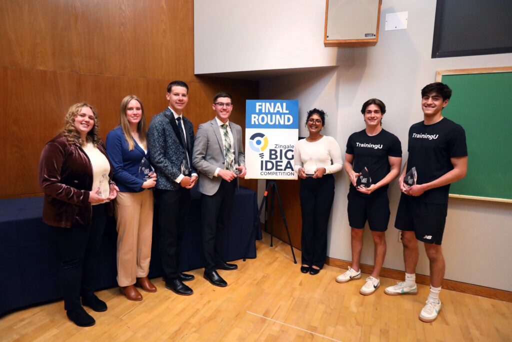 Students standing with their prizes