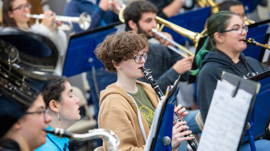a group of students playing brass instruments