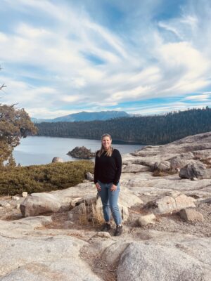 Professor standing with a vista in the background
