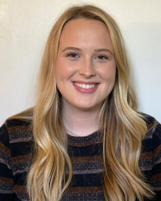 portrait of a person with long blonde hair