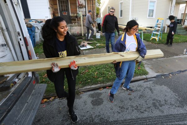 students building a community project