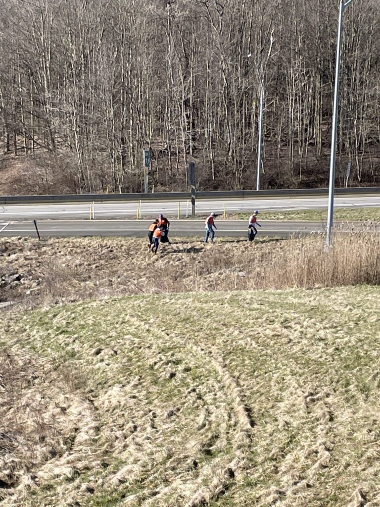 a group of people riding horses on a road