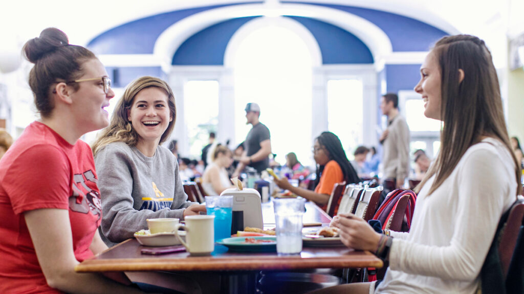a group of students sitting at a table