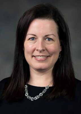 portrait of a woman smiling at camera