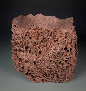 a brown stone with holes